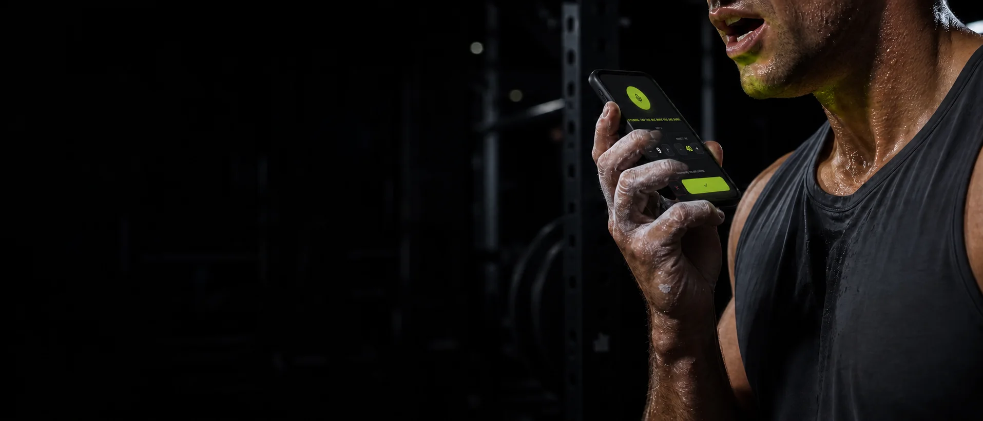 A lifter at a rack speaking a set into their phone
